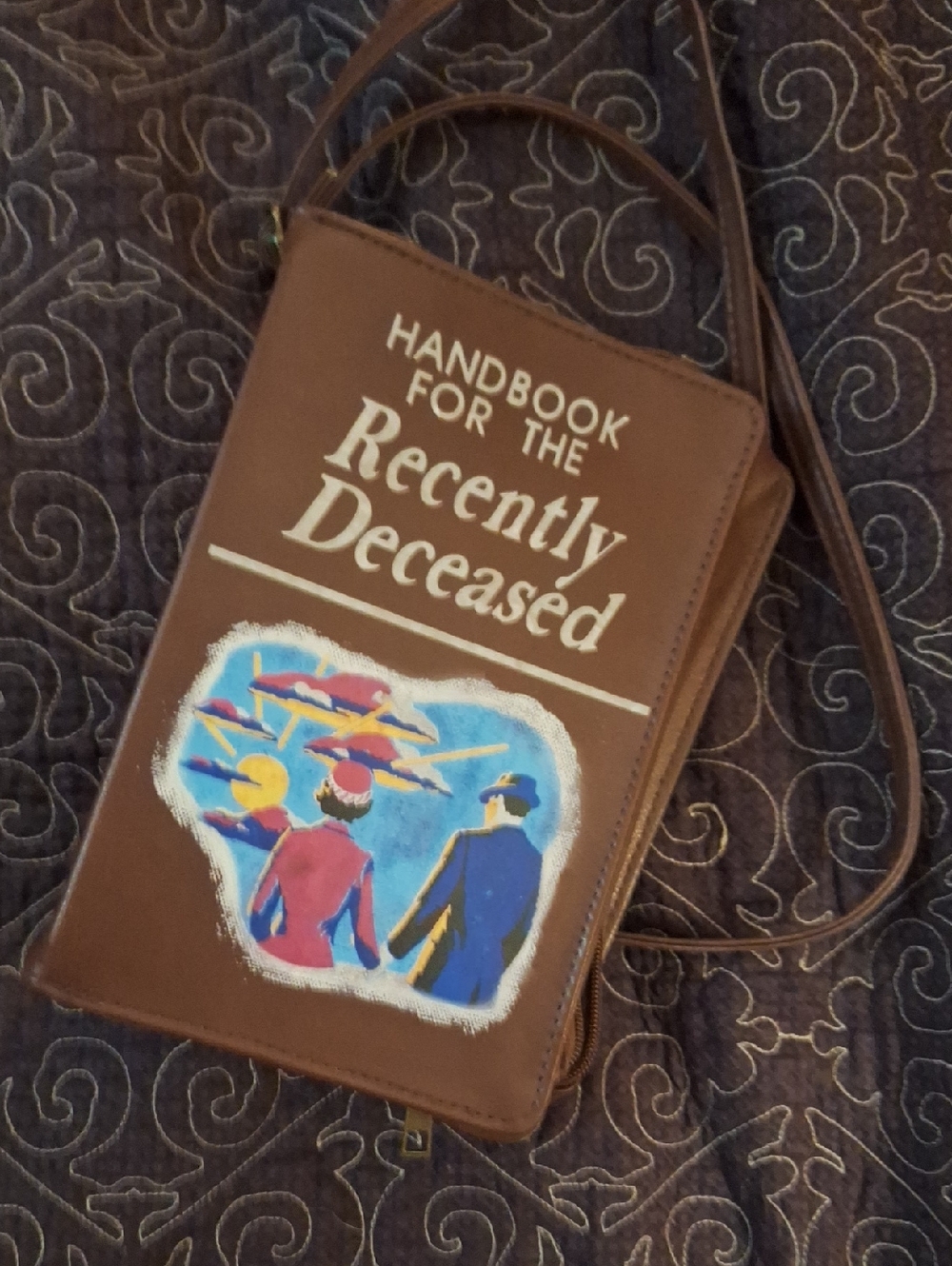 Handbook for the Recently Deceased Brown Crossbody Bag